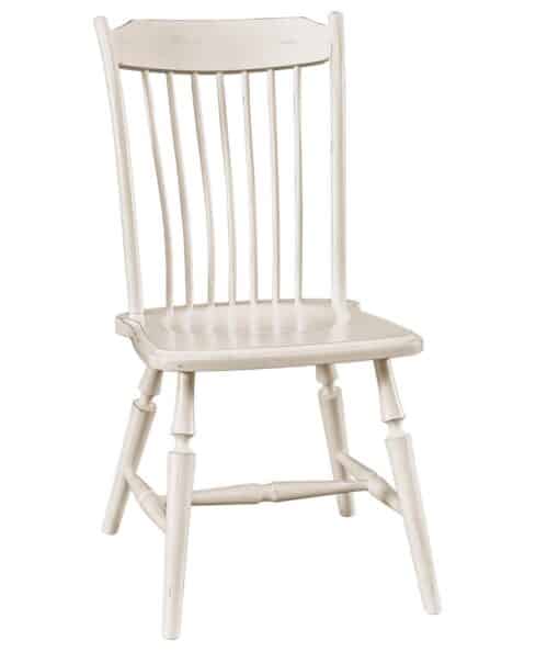 The Crayton Dining Chair embodies that warm cozy farmhouse feel with it's carved out posts and slim spindles.